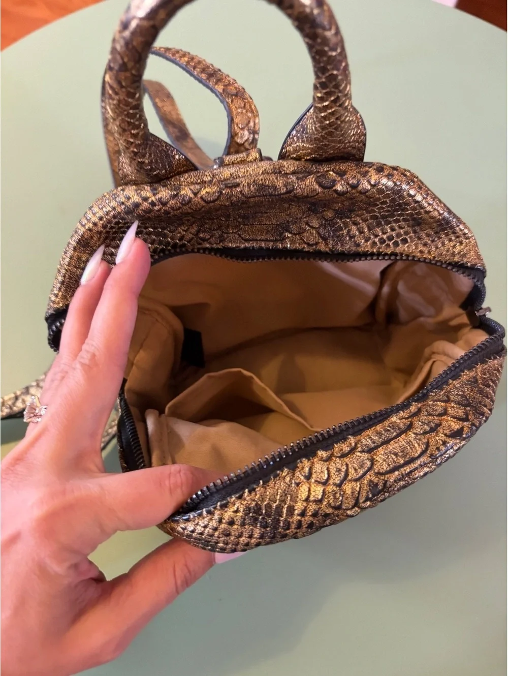 BCBG Mini Backpack in Brown Snakeskin Pattern